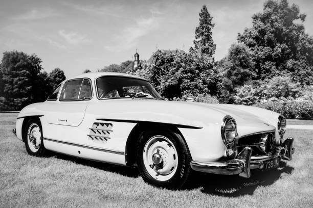 Mercedes-Benz 300SL Gullwing classic sports car in black and white Mercedes-Benz 300SL Gullwing sports car. The car is on display during the 2014 Classic Days event at Schloss Dyck. Vintage style image. mercedes benz photos stock pictures, royalty-free photos & images