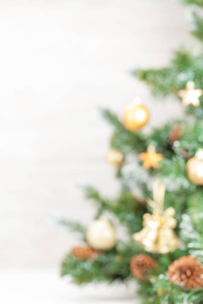 istock Christmas blurred greeting card with decorated tree 1262247795