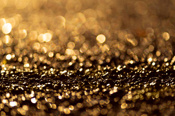 istock Sparkling light boke blur. Sea pebbles. 1262248914