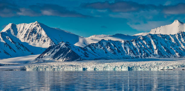 istock Glacier and Snowcapped Mountains, Arctic, Norway 1262249405