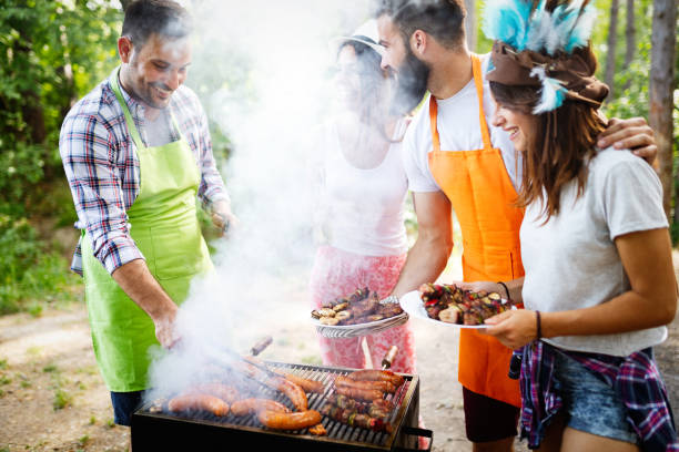 istock Friends having fun in nature doing bbq 1262251354