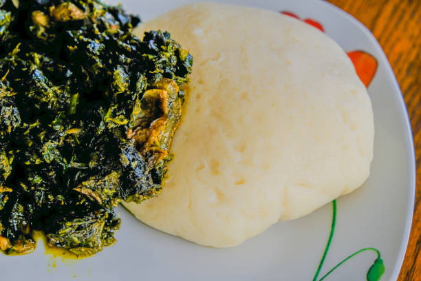 istock Nigerian Pounded yam served with Afang Soup 1262255127