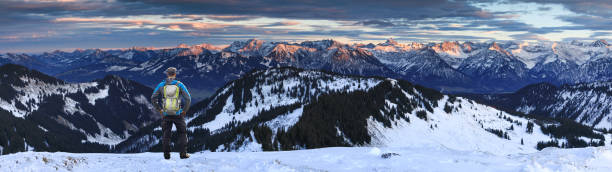 Free Stock Photo of Man Standing on Snow Covered Mountain Top ...