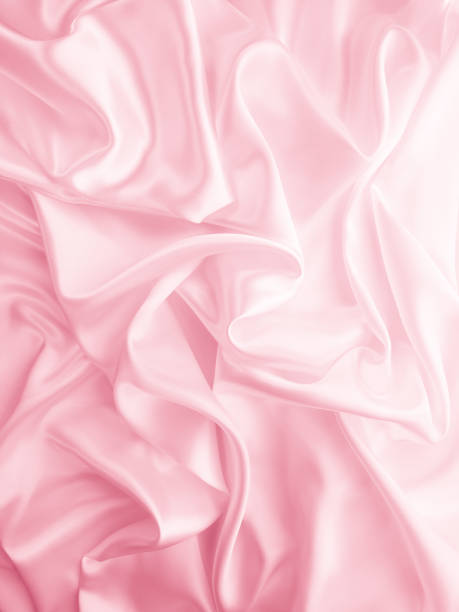 istock Beautiful elegant wavy light pink satin silk 1262265158
