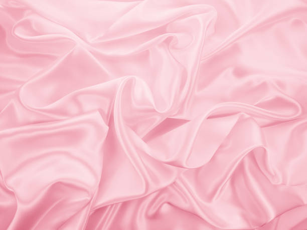 istock Beautiful elegant wavy light pink satin silk 1262265195