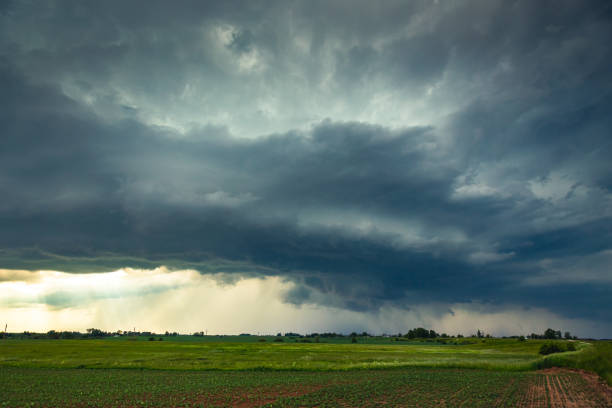 istock Supercell storm clouds with wall cloud and intense rain 1262270272