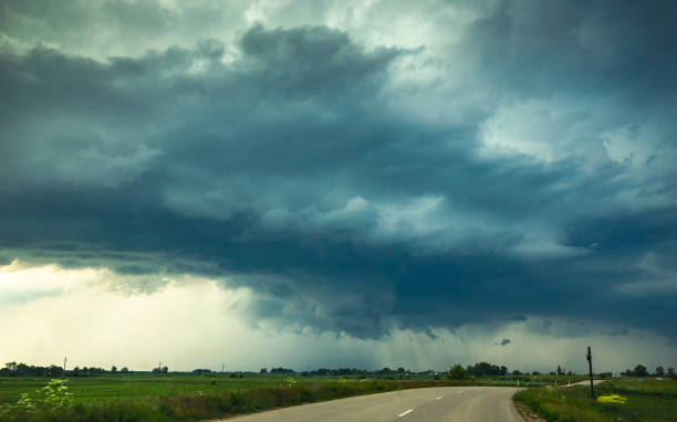 istock Supercell storm clouds with wall cloud and intense rain 1262270301