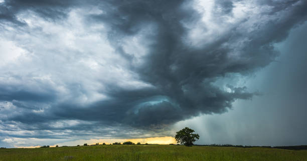 istock Supercell storm clouds with intense tropic rain 1262270638
