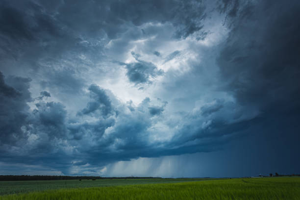 istock Supercell storm clouds with intense tropic rain 1262270722