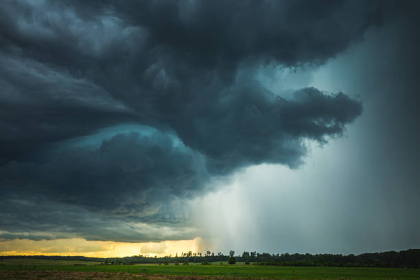 istock Supercell storm clouds with intense tropic rain 1262270757