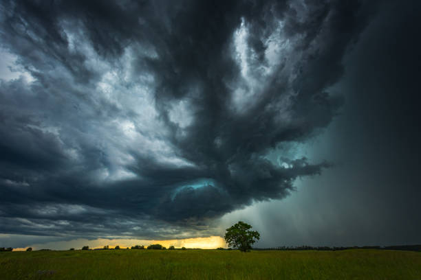istock Supercell storm clouds with intense tropic rain 1262270769