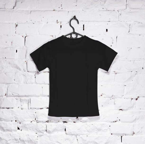 istock Black t-shirt for kids on hanger 1262273601