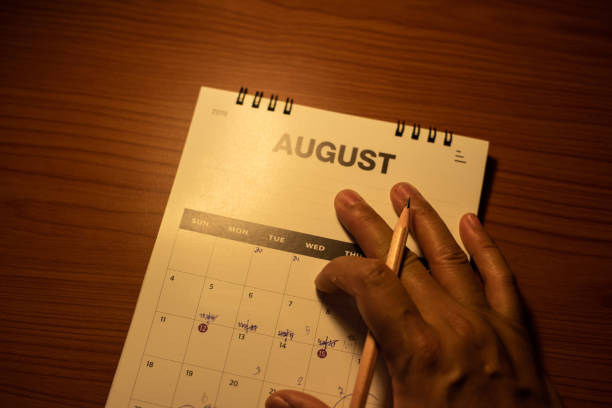 istock Blurred calendar on wood table in planning concept. 1262273790
