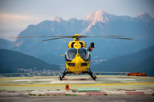 Hospital helicopter in a dolomites heliport
