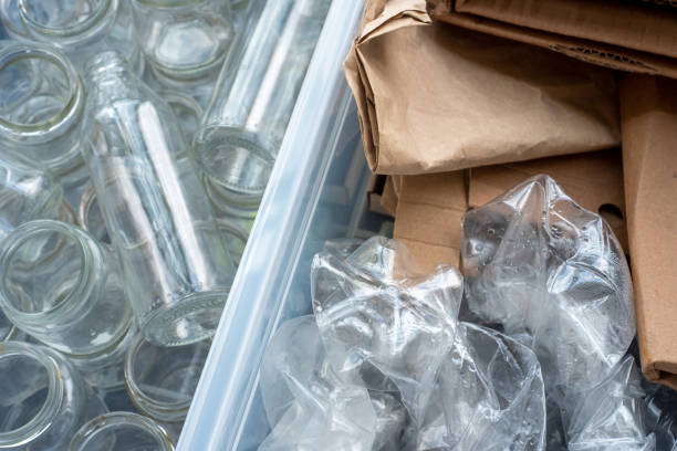 istock Plastic bottles, glass and cardboard are sorted for recycling. 1262275628