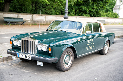 Berlin. Germany-May 31, 2017: Front view of Exclusive Luxury green Rolls Royce Silver shadow II car limousine parked in city