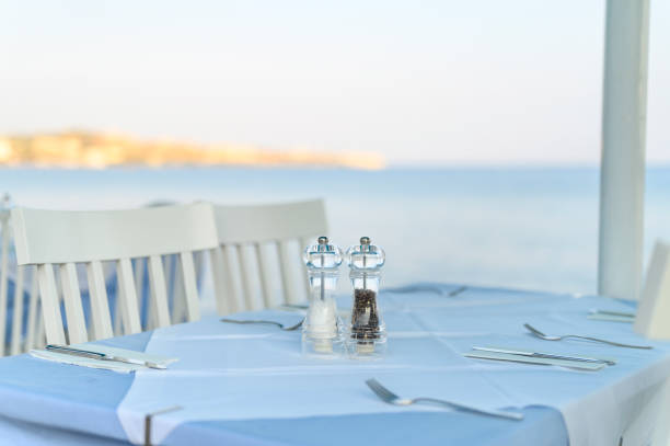 istock cafe tables on the sea mediterranean embankment. selective focus 1262282161