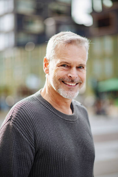 istock Smiling senior essential worker in city 1262282260