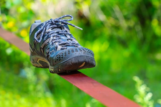 A woman is tying shoelaces