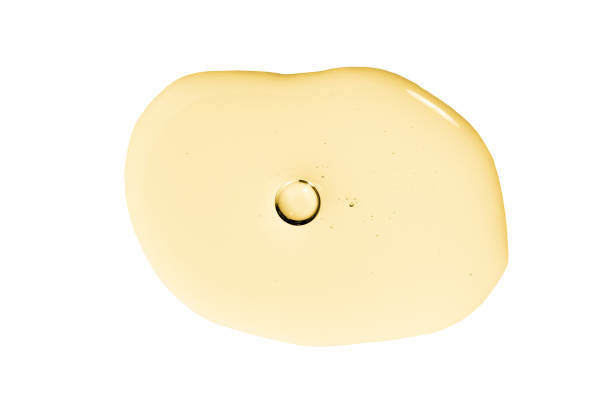 istock Cannabidiol drop, extraction cannabis, hemp or cbd oil. Ceramide drop, emulsion with enzyme. Hyaluronic acid serum swatch with vitamin C 1262285189