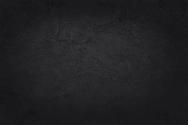 istock Dark grey black slate texture in natural pattern with high resolution for background and design art work. Black stone wall. 1262286505