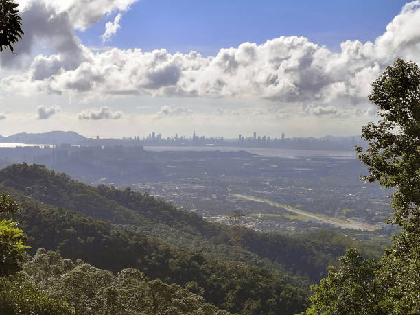 istock Shenzhen skyline under the clouds from Tai Mo Shan, Hong Kong 1262286509