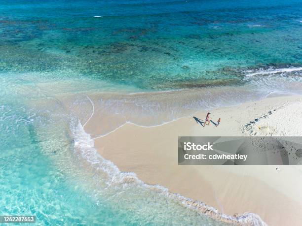 Aerial View Of Mother And Child On Sandy Spit British Virgin Islands Stock Photo - Download Image Now
