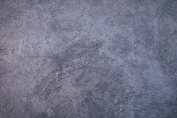 istock Cracked cement floor, Cracked stone wall,Crack concrete floor texture. cement concrete is Damaged floor, texture of concrete. cement wall background 1262287716