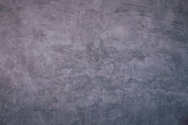 istock Cracked cement floor, Cracked stone wall,Crack concrete floor texture. cement concrete is Damaged floor, texture of concrete. cement wall background 1262287747
