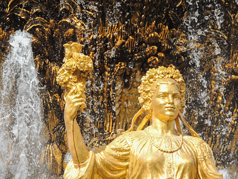 Beautiful golden statue. Macro. Fountain.