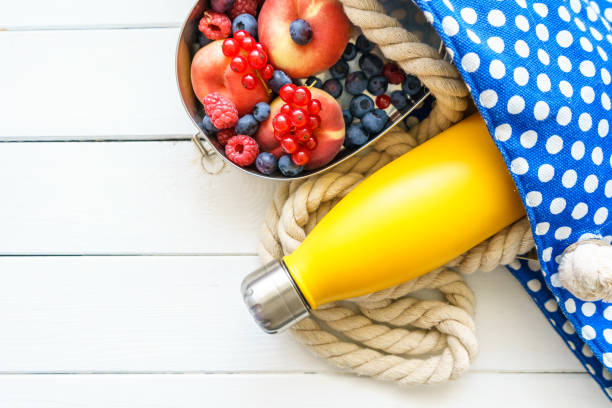 istock Bathing bag with a water bottle and fresh fruit 1262289283