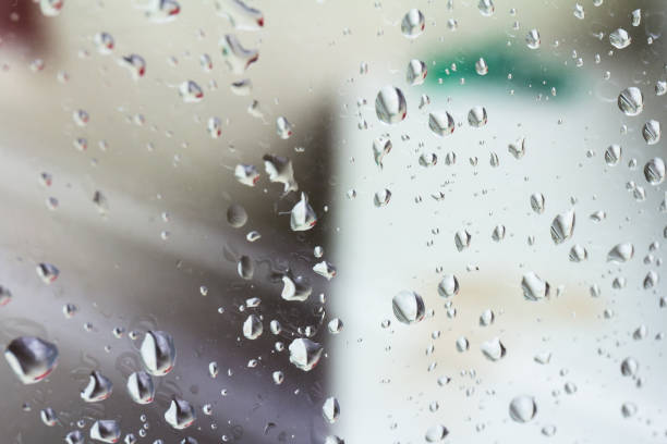 istock A small raindrop rests on the glass after rain. 1262292835
