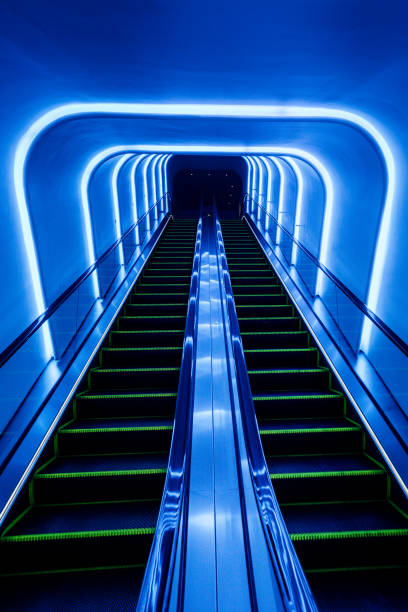 istock Escalator in tunnel moving up 1262292951
