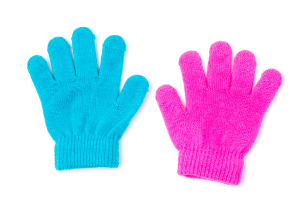 Kid knitted gloves with hand, isolated on white background.