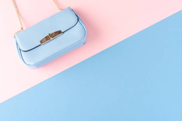 istock Blue handbag on abstract background. Flat lay 1262293197