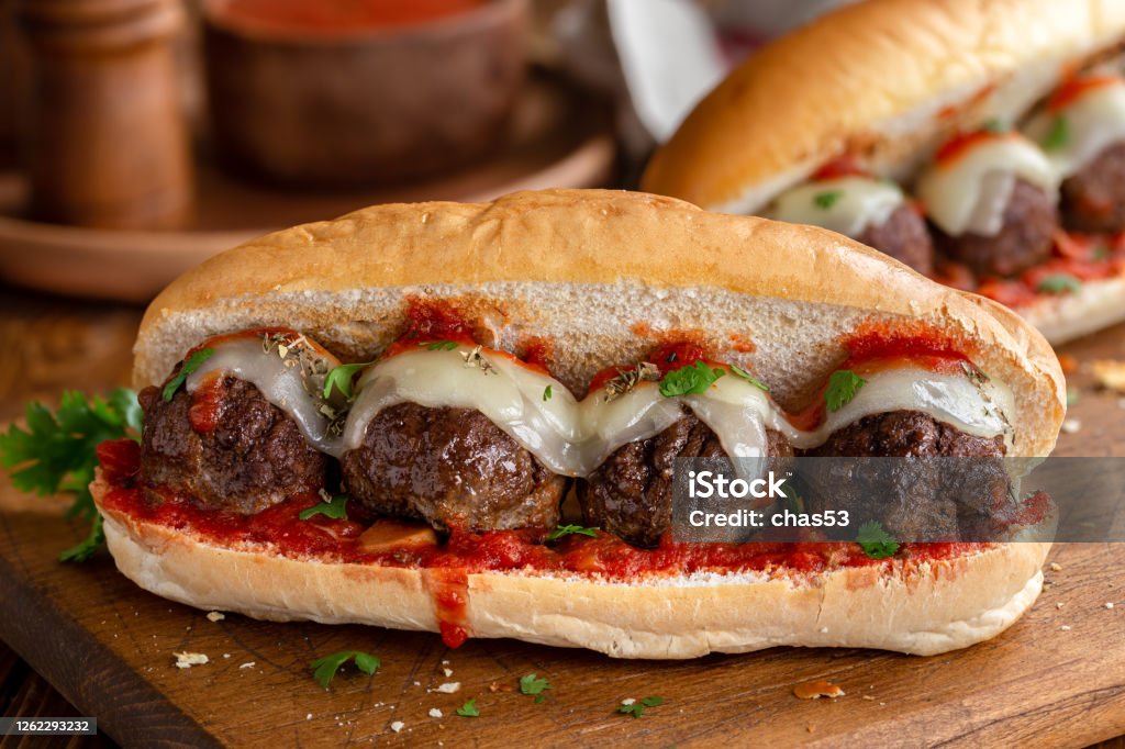 Meatball Sub Sandwich Meatball sandwich with tomato sauce and cheese on a hoagie roll Meatball Stock Photo