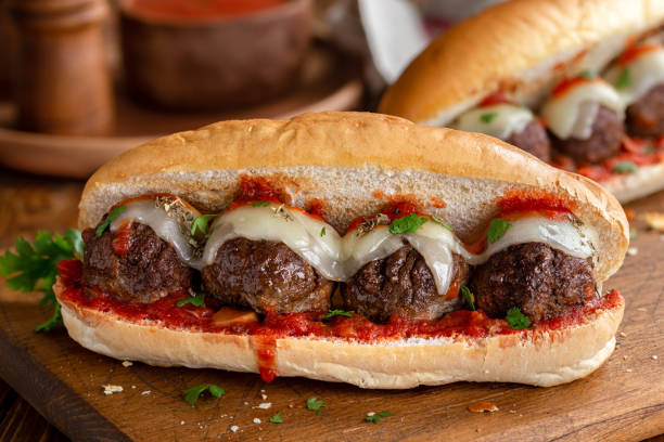 Meatball Sub Sandwich Meatball sandwich with tomato sauce and cheese on a hoagie roll submarine photos stock pictures, royalty-free photos & images
