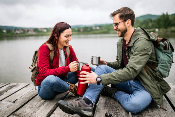 istock Morning coffee at lake pier 1262293318