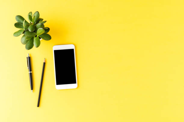 istock Business background with phone and accessories 1262294251