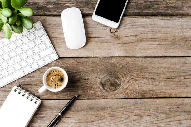 istock Overhead shot of office desktop with copyspace 1262294998