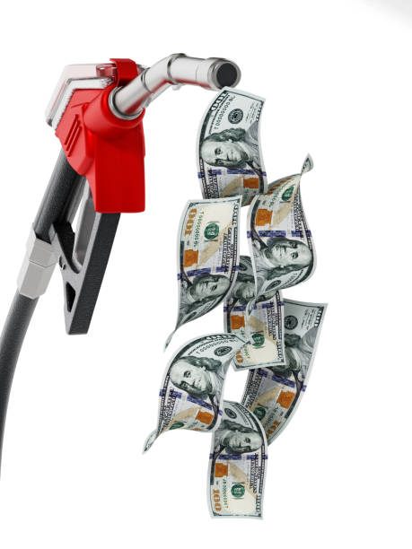 istock Stack of flowing Dollar bills at the tip of fuel pump 1262295867
