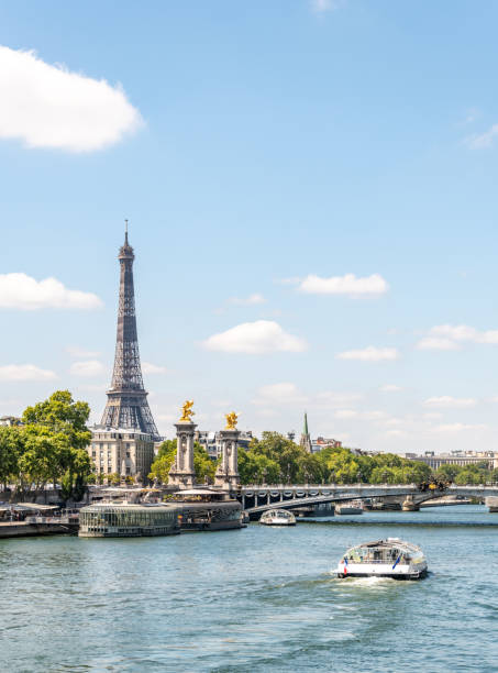 istock Boats on the River Seine by The Eiffel Tower in Paris 1262296206