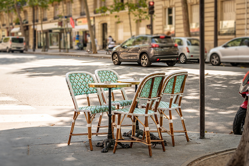 Street cafe seating and table in Paris, France