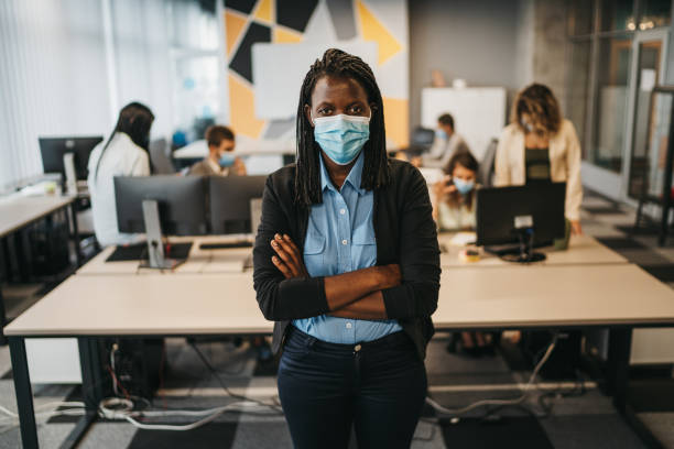istock Confident business woman in modern office 1262299425