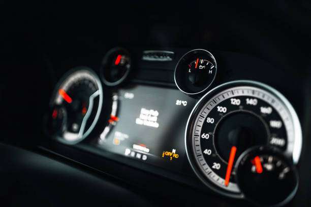 Modern car dashboard with illumination Modern car dashboard with illumination kilometer photos stock pictures, royalty-free photos & images