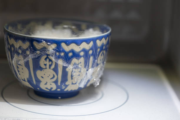 rice in a bowl heated in a microwave oven
