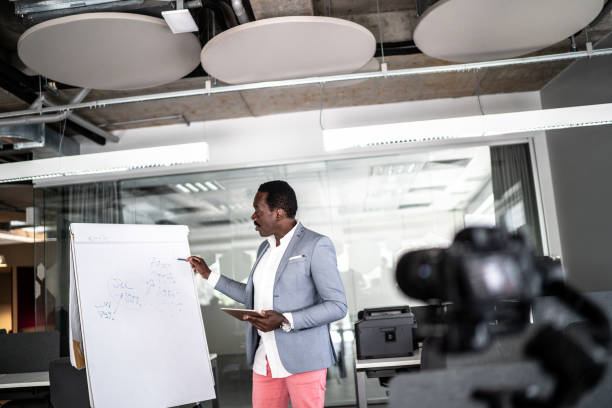 Businessman recording a video in the office