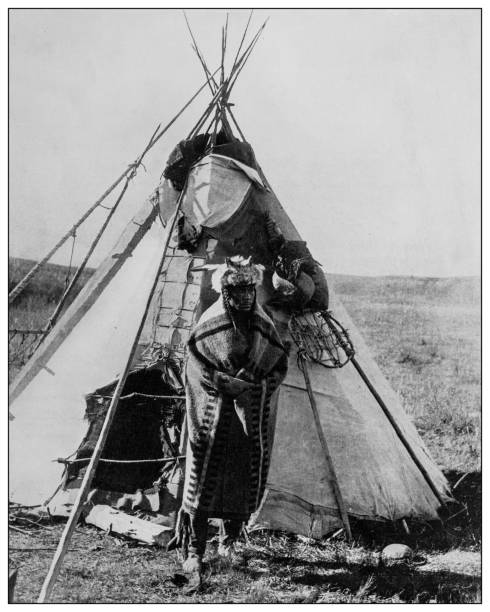 istock Antique black and white photo: Pisquapita, (Hair in Knot) Cree Indian, Calgary 1262303713