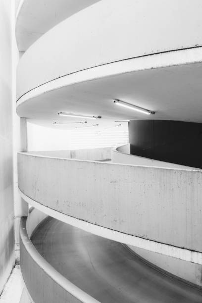 istock Empty underground garage inteior with concrete wall and floor 1262305707