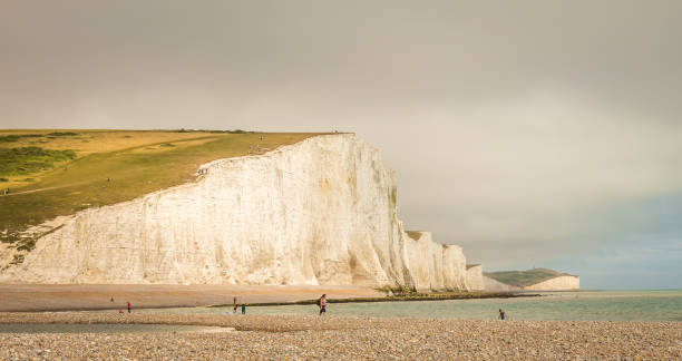 istock Dramatic white cliffs and beach at Cuckmere Haven, Seven Sisters Country Park 1262305935